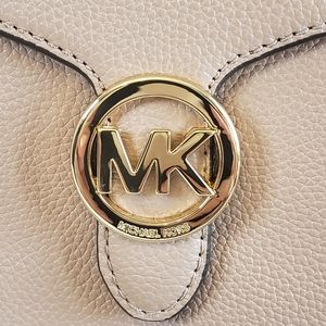 Michael Kors crossbody or shoulder leather bag.